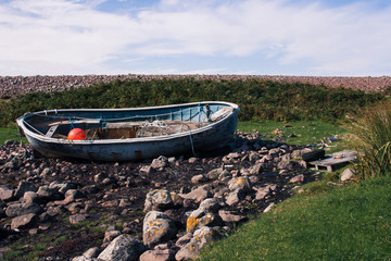 old fishing boat on land