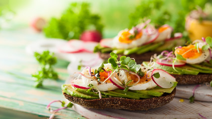 Wall Mural - Open sandwiches with avocado and egg