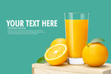 Glass of fresh orange juice on wooden box, Fresh fruits Orange juice in glass with group on blue background with copy Space for your text.