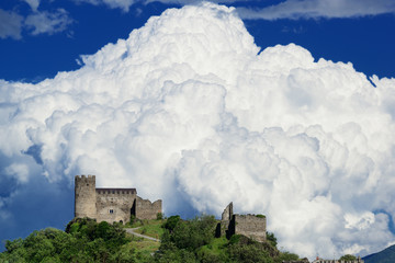 Sticker - Ancient castle with growing cloud on the background