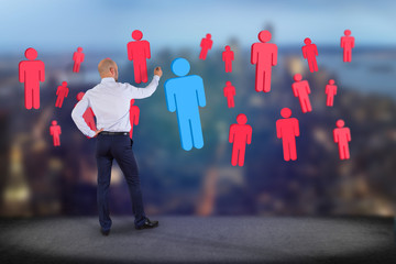 Poster - Businessman in front of a wall Intruder in a group of network people - Business and contact concept