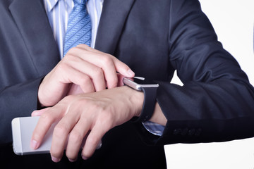 Poster - Technology, gadget and business concept - crop of Business Man in formal suit with mobile phone useing application smart watch concept