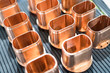 © NDABCREATIVITY - Copper tube metal scrap parts background
