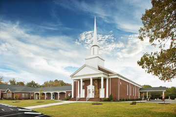 white and brown baptist church exterior with white steeple tower, religion, god, priest