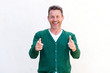© mimagephotos - Happy man pointing both fingers on white background