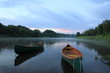 © charline - canoe on river in canada sunrise