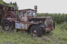 Cab Of Rusting Farm Truck In Field