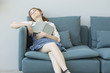 © sebra - Young girl sleeping while reading book