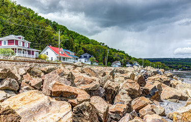 Wall Mural - Saint Lawrence river with cityscape or skyline of Saint-Irenee, Quebec, Canada in Charlevoix region