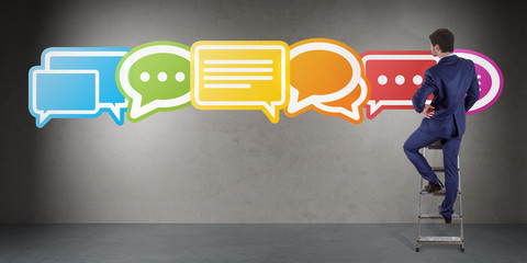 Wall Mural - businessman using social network interface on a wall 3d rendering