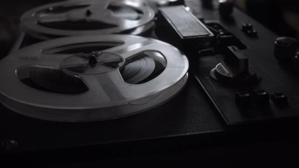 Wall Mural - Old tape recorder is playing music, close up