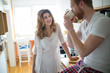 © NDABCREATIVITY - Romantic couple speding time together in kitchen