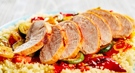 Wall Mural - Poultry cut in slices served with couscous