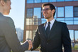 © pressmaster - Successful business partners handshaking after negotiation