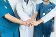 © Have a nice day  - Doctors and nurses coordinate hands. Concept Teamwork, happy doctors working together as team for motivation, success medical health care ,blue tone color