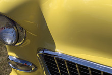 Headlights On A Yellow Car