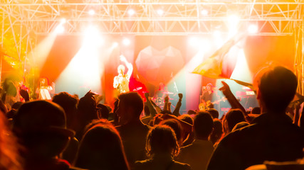 Concert crowd against bright stage lights