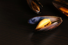 Mussels In Shells On A Black Background