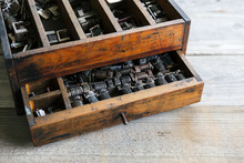 Old Wood Drawer Filled With Vintage Metal Numbering Inserts For Printer