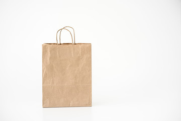  Ecological paper bag on a white background