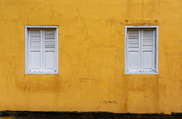 Yellow wall white window