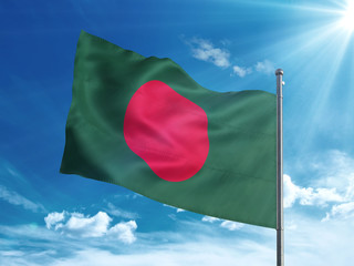 Bangladesh flag waving in the blue sky