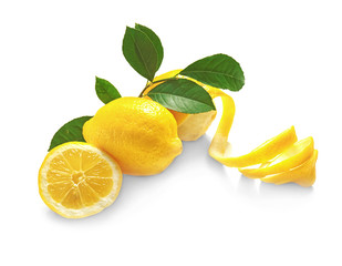 Wall Mural - Composition with ripe lemons and twist on white background