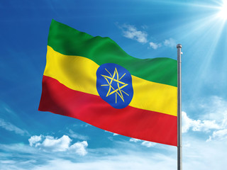 Ethiopia flag waving in the blue sky