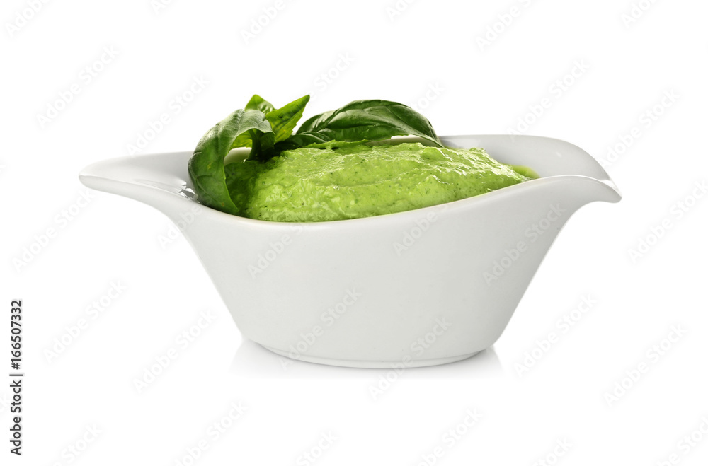Delicious yogurt sauce in gravy boat on white background