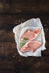 Poster - Raw steak of pork on bone with spice