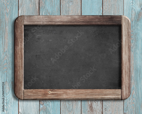 Fotografía old chalkboard or blackboard on blue wood 3d illustration
