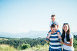 © phpetrunina14 - father and little son on his shoulders , mother