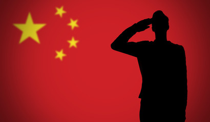 Wall Mural - Silhouette of a soldier saluting against the china flag