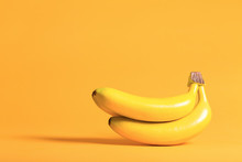 Bunch Of Bananas On A Bright Yellow Background