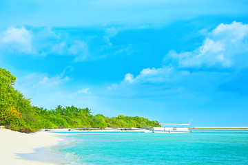 Poster - View of boat and sea beach at tropical resort