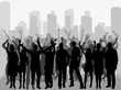 © zolotons - Vector silhouette of a crowd of people on a city background