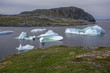 icebergs in quiet bay below Brimstone Head on Fogo Island, Newfoundland