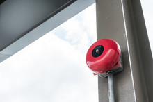 Red Fire Alarm Bell On Metal Frame