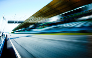 Wall Mural - Racetrack in motion blur, racing sport background .