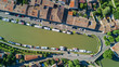 Aerial top view of boats in Canal du Midi from above, family travel by barge and vacation in Southern France
