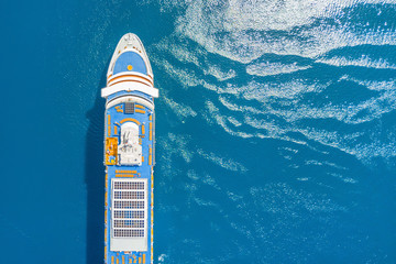 part of a cruise liner in the blue sea, top view