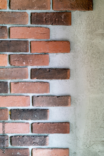 Decorative Red Bricks At The End Of A Wall With Alternating