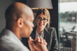 © Studio Firma/Stocksy - Business People Discussing Ideas