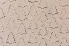 Background Of Flour With Stars And Christmas Tree Shapes