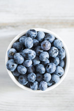 Blueberries In A White Bowl.