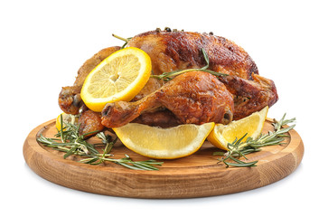 Sticker - Wooden board with tasty homemade lemon chicken on white background