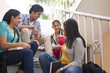 © IndiaPix - College students sitting on a staircase