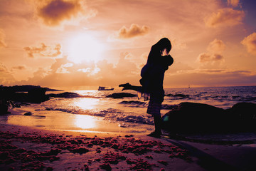 Sweet girlfriend on the beach at evening.