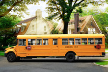 Yellow School Bus On The City Street