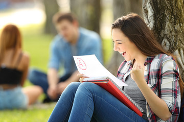 Excited student checking an approved exam